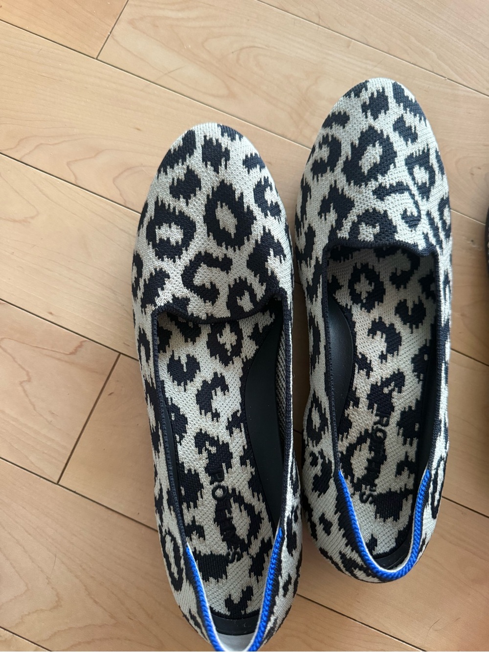 Rothy's Black and Cream Leopard Knit Slip-On Flats